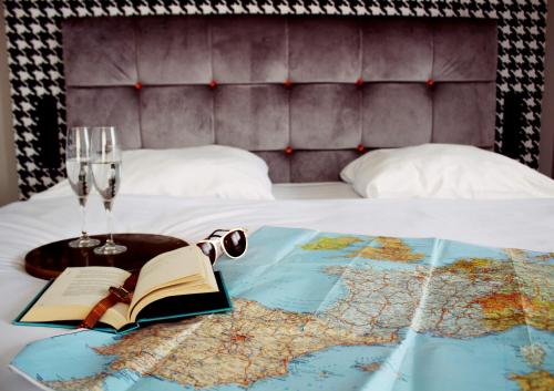 Letto o letti in una camera di Hotel Pomarańczowa Plaża