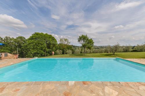 an image of a swimming pool in a yard at Podere Casanova in Montespertoli