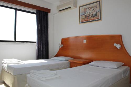 Katil atau katil-katil dalam bilik di Florea Hotel Apartments