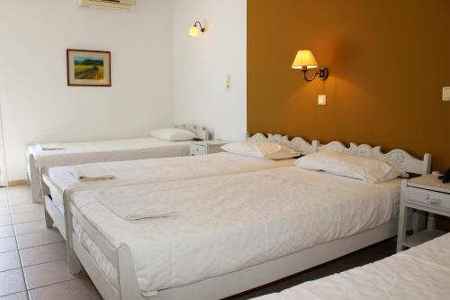 Ikaros Art Hotelにあるベッド