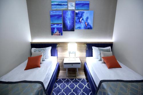 Ένα ή περισσότερα κρεβάτια σε δωμάτιο στο Vialand Palace Hotel