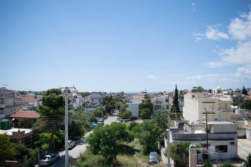 a view of a city with buildings at Snooze H in Athens
