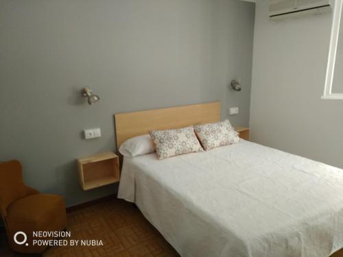 Posteľ alebo postele v izbe v ubytovaní ADEREZO Hostal Restaurante