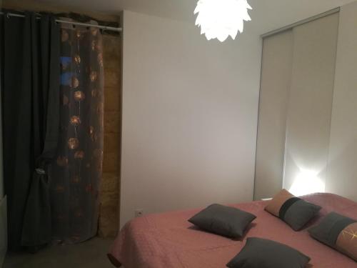 Postel nebo postele na pokoji v ubytování Gîte Les Combes Montignac Lascaux