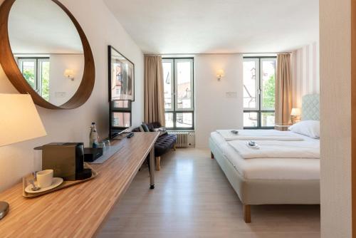 Postel nebo postele na pokoji v ubytování Hotel Am Dom