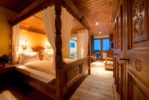 Postel nebo postele na pokoji v ubytování Hotel Astoria