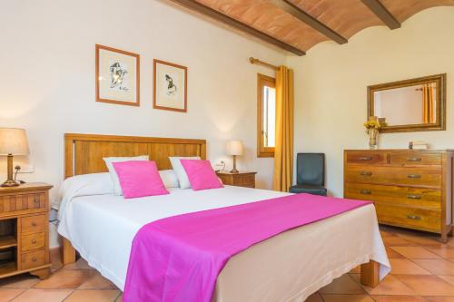 Cama o camas de una habitación en Can Mostatxet