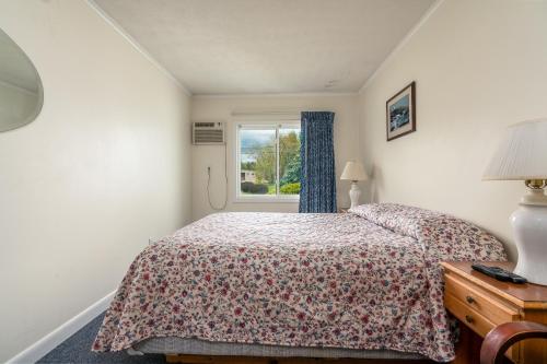 Postel nebo postele na pokoji v ubytování Ne'r Beach Motel
