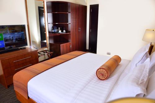 Postel nebo postele na pokoji v ubytování The HUB Hotel