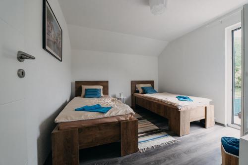 Katil atau katil-katil dalam bilik di Apartman Ena