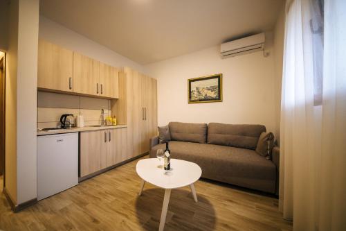 Η κουζίνα ή μικρή κουζίνα στο Apartments Vojislav