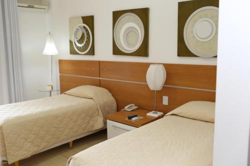 Katil atau katil-katil dalam bilik di Elsenau Hotel