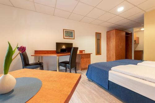 Ένα ή περισσότερα κρεβάτια σε δωμάτιο στο Boardinghouse Burgpark