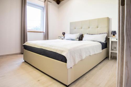 Postel nebo postele na pokoji v ubytování Casa MiA