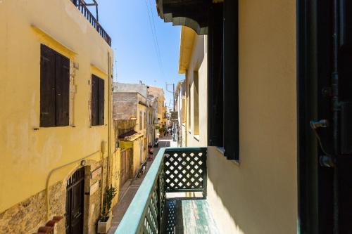 a view of an alley between two buildings at Ink Hotels House of Europe in Rethymno Town