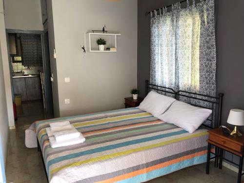 Cama o camas de una habitación en Kakovatos Studios