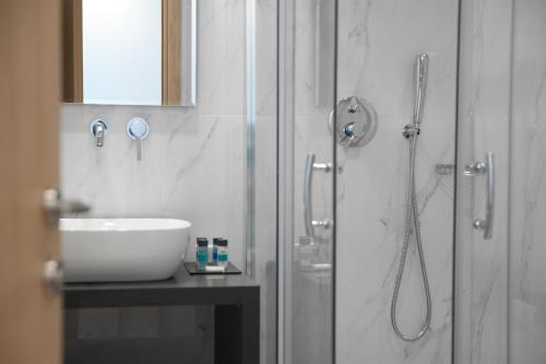 Koupelna v ubytování Athenaeum Smart Hotel