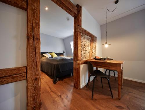 Uma cama ou camas num quarto em Guesthouse Bärenbad