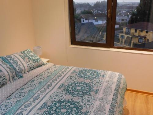 Una cama o camas en una habitación de Los Magnolios
