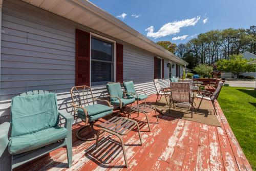 a group of chairs sitting on a porch at Nautical North in Ocean City