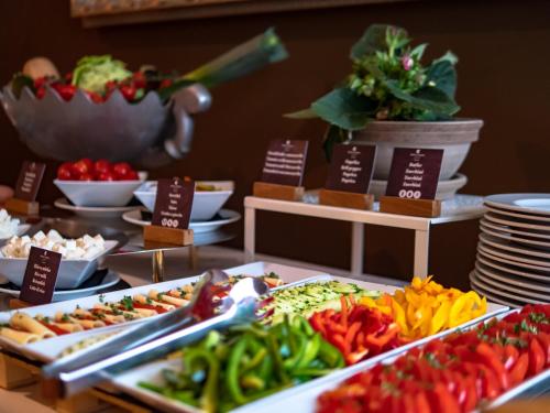 a buffet of different types of vegetables on a table at Hotel Evropa in Celje