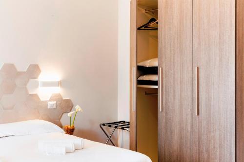 Postel nebo postele na pokoji v ubytování Roma Talenti Fucini B&B