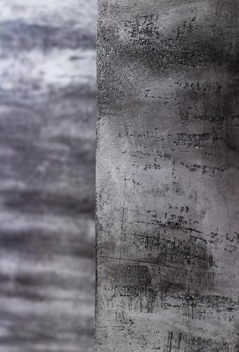 a concrete pillar with writing on it next to the water at Willa Kłodzko-Zacisze - sauna, siłownia, komnata solna, parking in Kłodzko