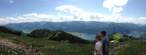 a man and woman standing on top of a mountain at Landhaus Lilly in Obertraun