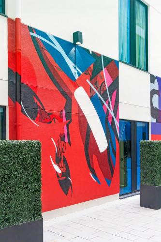 a mural on the side of a building at The Hendrick Smithfield in Dublin