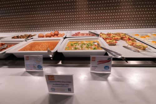 a buffet line with many different types of food at Nafsika Hotel - Adults Only in Dassia