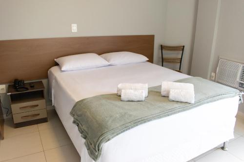 Katil atau katil-katil dalam bilik di Hotel Central
