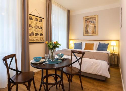 Ένα ή περισσότερα κρεβάτια σε δωμάτιο στο SeNo6 Apartments