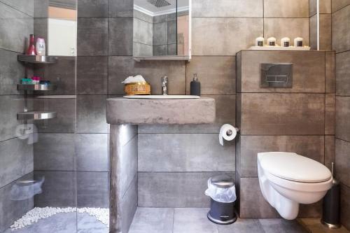Kúpeľňa v ubytovaní Isminis House