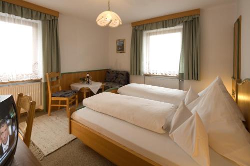 Posteľ alebo postele v izbe v ubytovaní Hotel Zita