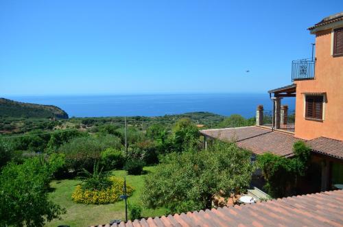 a view of the garden from the house at Hotel Relais Pian delle Starze in Marina di Camerota