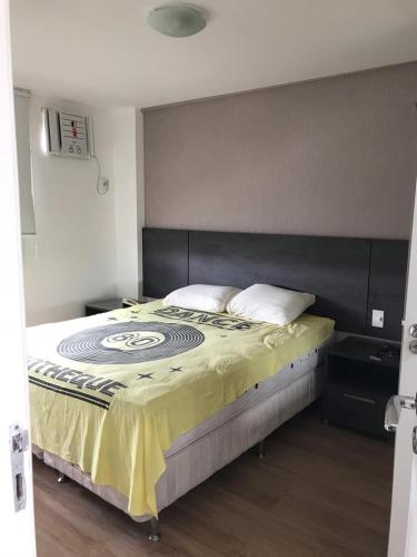 מיטה או מיטות בחדר ב-GRAN LENÇOIS FLAT