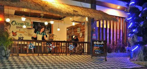 a store front of a restaurant with a sign in front at Ocean Terrace Suite And Spa Luxury in Nusa Penida