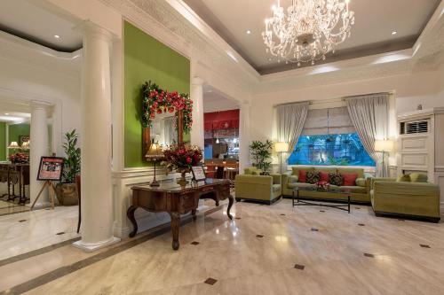 Ruang duduk di Orchid Garden Suites