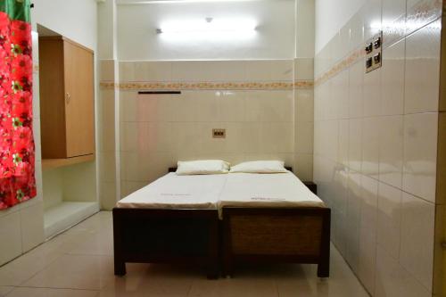 Ett badrum på Hotel Ganesh Lodge