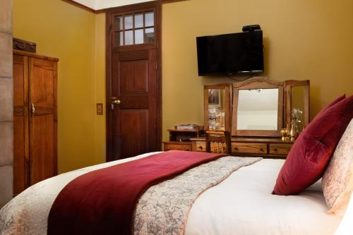 Katil atau katil-katil dalam bilik di Bethulie Guest Farm