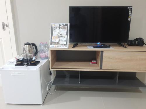 TV a/nebo společenská místnost v ubytování iResidence hotel