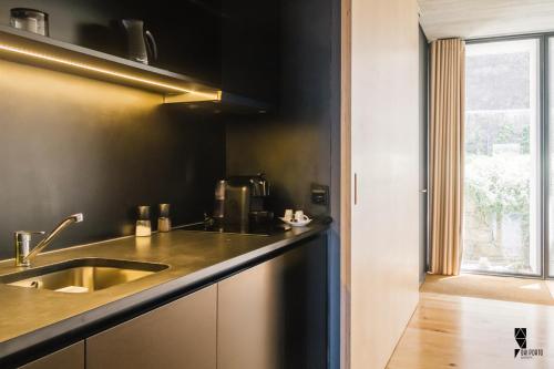 Kuchyň nebo kuchyňský kout v ubytování Oh! Porto Apartments