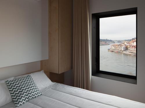Postel nebo postele na pokoji v ubytování Oh! Porto Apartments