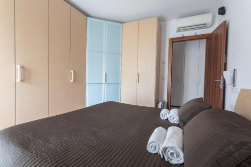 Ένα ή περισσότερα κρεβάτια σε δωμάτιο στο Sunrise Apartment Venice
