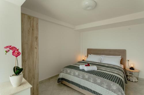 Una cama o camas en una habitación de Apartments Belvedere