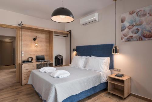 Postel nebo postele na pokoji v ubytování Aequor Luxury Rooms & Apartments
