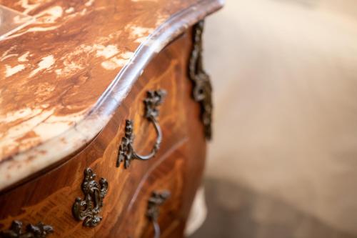 a close up of a wooden table at Villa Belverde Boutique Hotel in Carrara