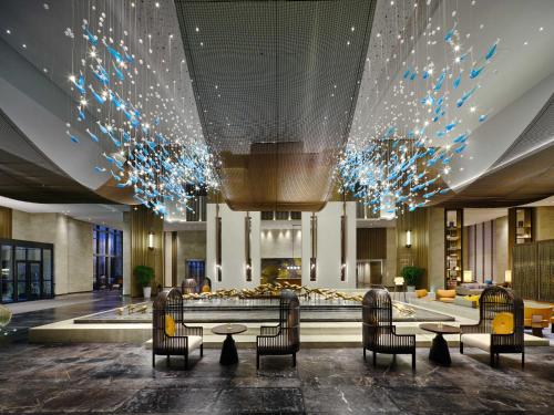Posezení v ubytování Primus Hotel Shanghai Sanjiagang - Offer Pudong International Airport and Disney shuttle