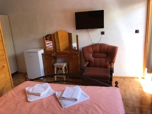 Televisyen dan/atau pusat hiburan di Guest House „ Mountain Rest“