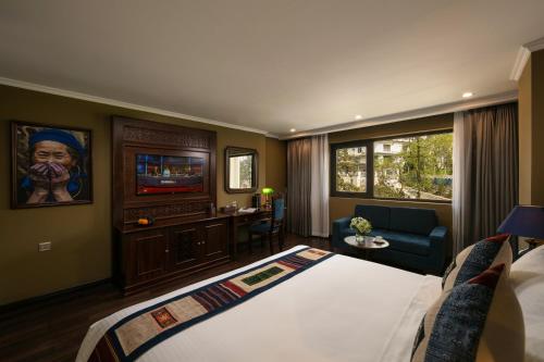 Postel nebo postele na pokoji v ubytování Pistachio Hotel Sapa